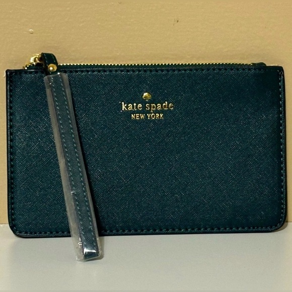 kate spade Handbags - Kate Spade Emerald Glitter Wristlet Discontinued NWT!